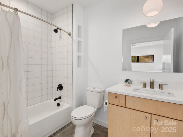 433 W Haywood St, Asheville, NC 28801 - full bathroom featuring shower / bath combination with curtain, toilet, vanity, and baseboards