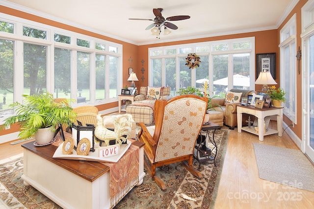 sunroom / solarium with ceiling fan