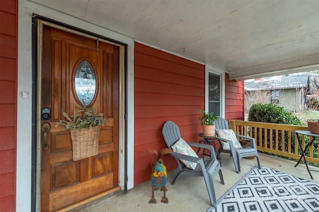 doorway to property featuring a porch