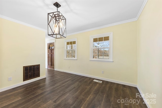 interior space featuring baseboards, visible vents, dark wood-style flooring, and crown molding