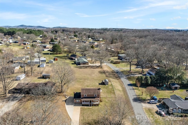 bird's eye view with a mountain view