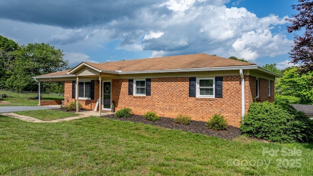 2609 Raintree St, Connelly Springs, NC 28612 - ranch-style house featuring brick siding, an attached carport, and driveway