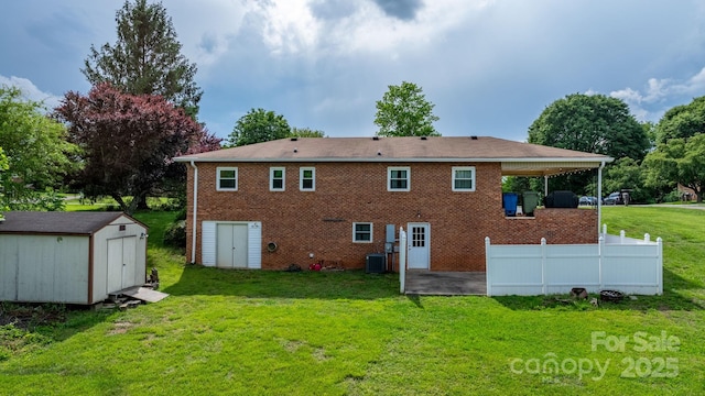 2609 Raintree St, Connelly Springs, NC 28612 - back of property featuring a patio area, brick siding, and cooling unit