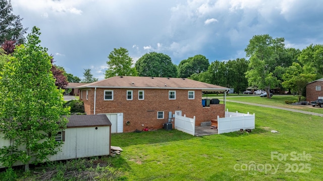 2609 Raintree St, Connelly Springs, NC 28612 - back of house with cooling unit and brick siding
