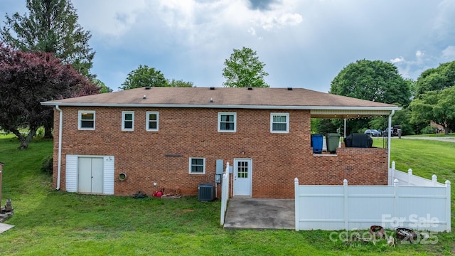 2609 Raintree St, Connelly Springs, NC 28612 - back of property featuring a patio area, central air condition unit, and brick siding
