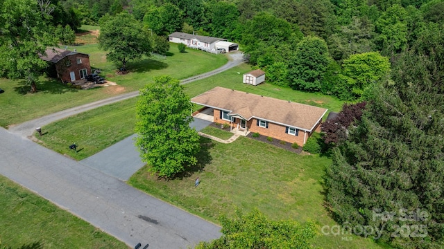 2609 Raintree St, Connelly Springs, NC 28612 - aerial overview of property's location with a heavily wooded area