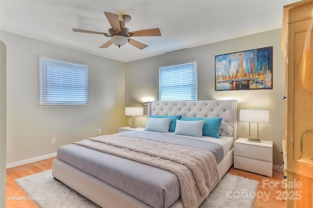 2609 Raintree St, Connelly Springs, NC 28612 - bedroom with wood finished floors, baseboards, and ceiling fan