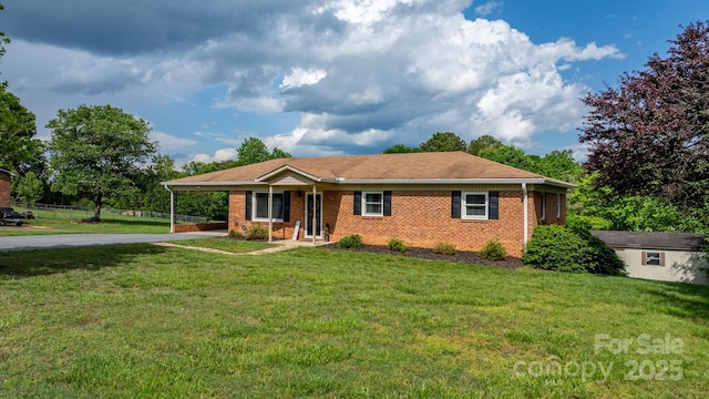 2609 Raintree St, Connelly Springs, NC 28612 - single story home with concrete driveway, a carport, and brick siding
