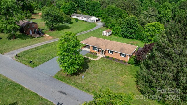 2609 Raintree St, Connelly Springs, NC 28612 - view of property location with a heavily wooded area