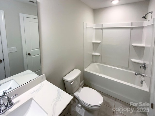 full bath featuring toilet, vanity, tub / shower combination, and tile patterned floors