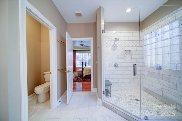 bathroom with visible vents, marble finish floor, toilet, baseboards, and a stall shower