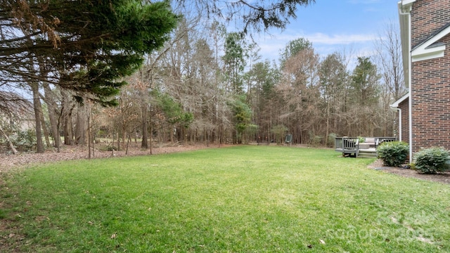 view of yard with a deck