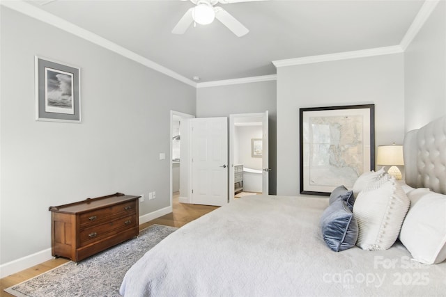 bedroom with ensuite bathroom, baseboards, a ceiling fan, wood finished floors, and ornamental molding