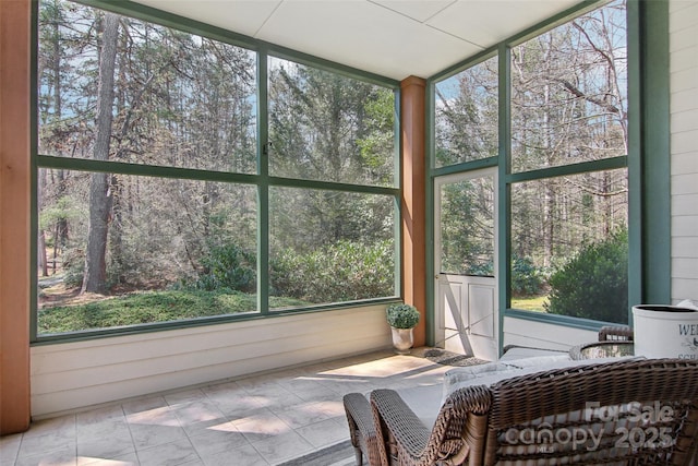 sunroom featuring plenty of natural light