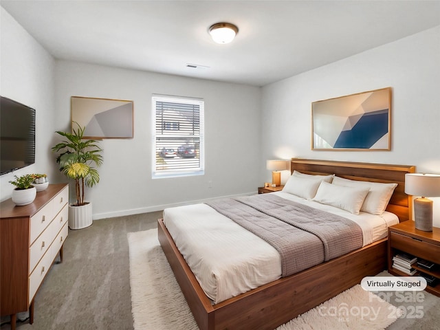 bedroom featuring carpet, visible vents, and baseboards