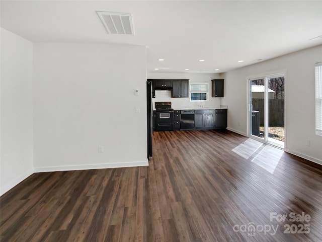 kitchen featuring visible vents, baseboards, light countertops, black appliances, and dark wood finished floors