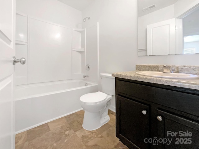 bathroom featuring toilet, washtub / shower combination, visible vents, and vanity