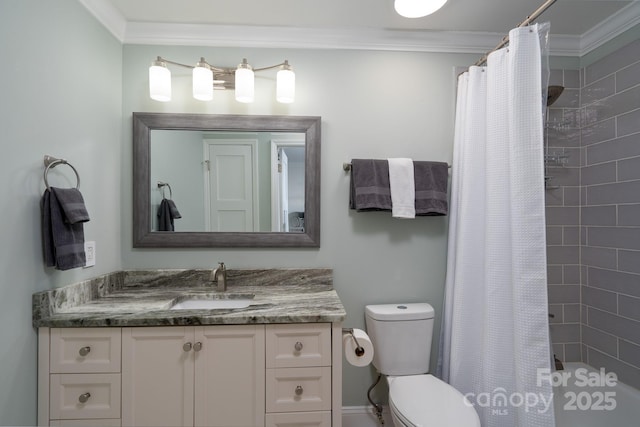 full bathroom with crown molding, vanity, and toilet