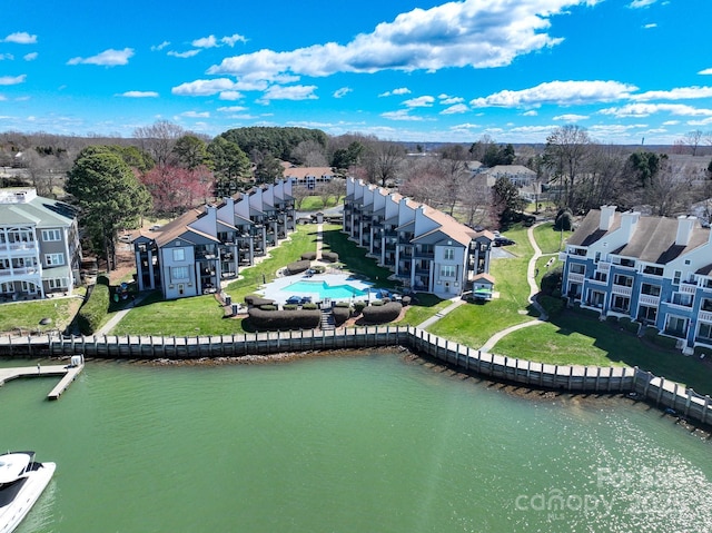 aerial view featuring a residential view and a water view