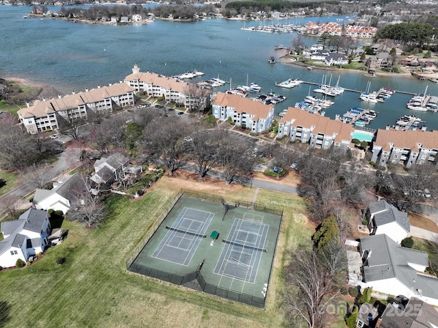 birds eye view of property featuring a water view