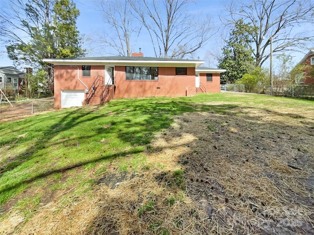 view of front of property featuring brick siding, a chimney, an attached garage, and fence