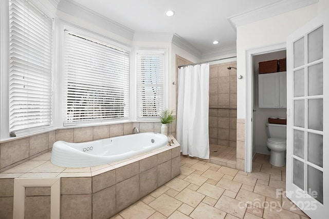 bathroom with a garden tub, a stall shower, crown molding, and toilet