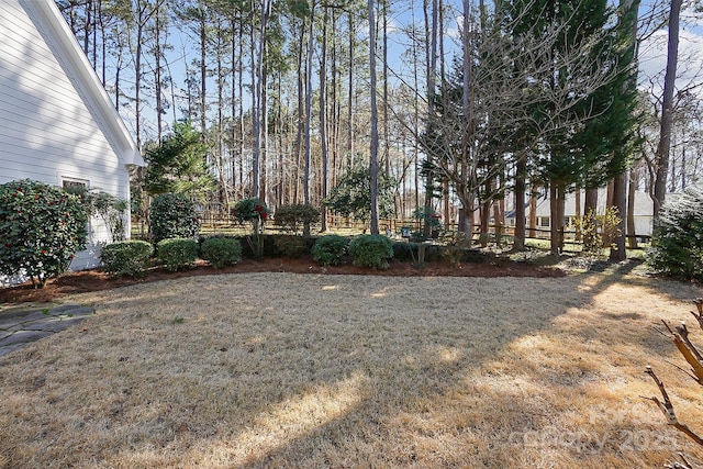 view of yard with fence