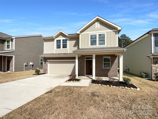 view of front of property with an attached garage, covered porch, brick siding, concrete driveway, and board and batten siding