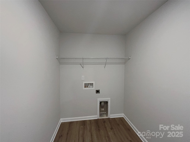 laundry area with hookup for a washing machine, hookup for an electric dryer, laundry area, baseboards, and dark wood finished floors