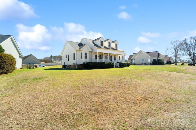 view of front facade featuring a porch and a front yard