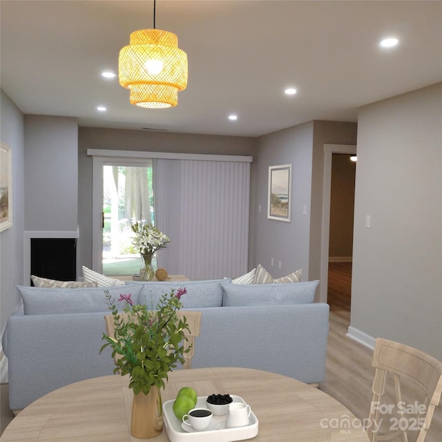 2545 Stockbridge Dr, Charlotte, NC 28210 - dining room featuring light wood finished floors, recessed lighting, and baseboards