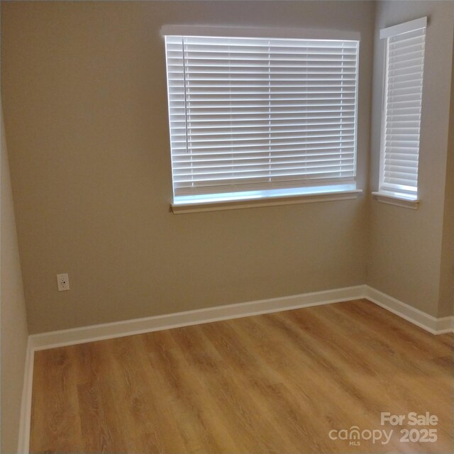 2545 Stockbridge Dr, Charlotte, NC 28210 - unfurnished room featuring wood finished floors and baseboards