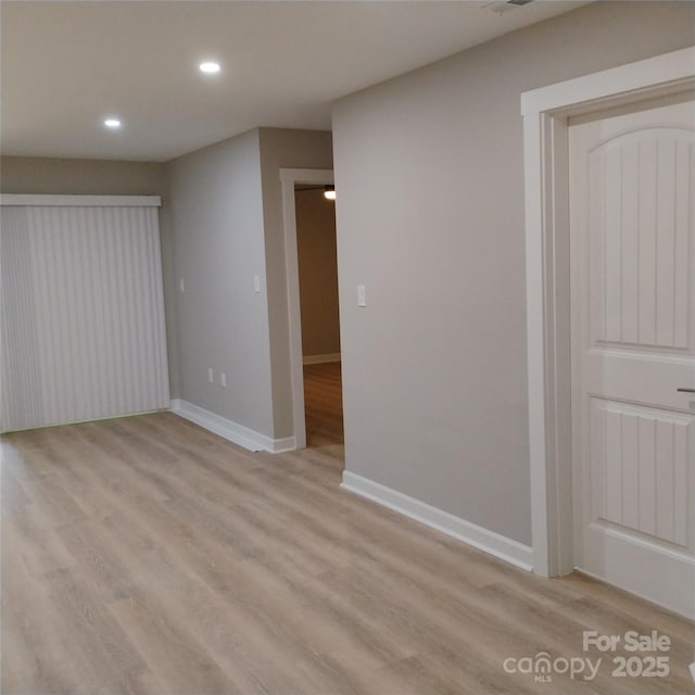 2545 Stockbridge Dr, Charlotte, NC 28210 - empty room featuring recessed lighting, baseboards, and light wood-type flooring