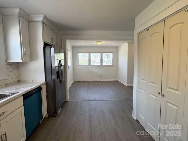 kitchen with baseboards, dark wood finished floors, dishwashing machine, stainless steel refrigerator with ice dispenser, and backsplash