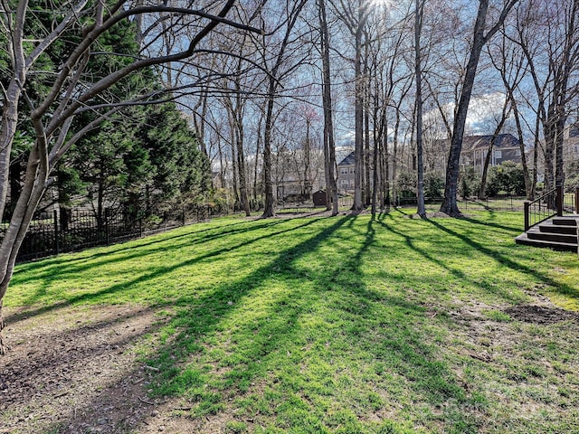 view of yard with fence