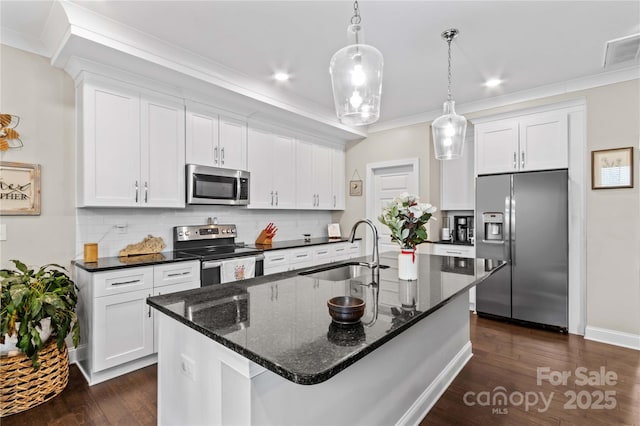 kitchen featuring a sink, stainless steel appliances, white cabinets, and crown molding