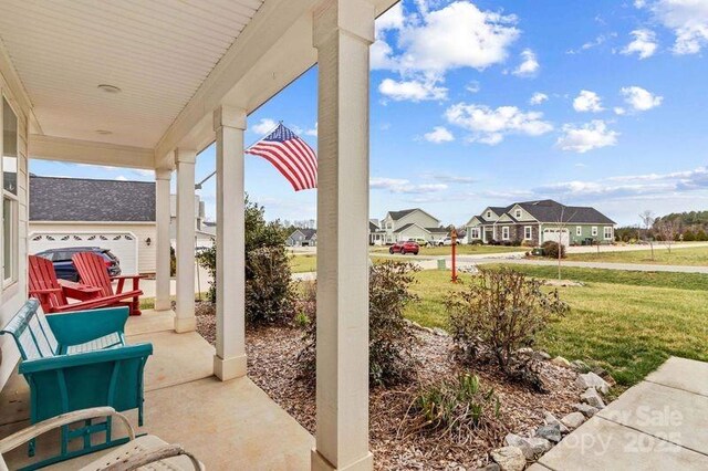 view of patio featuring a porch