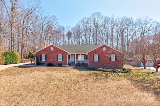 ranch-style home featuring crawl space, a porch, a front lawn, and brick siding