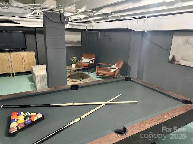 recreation room with concrete floors and billiards