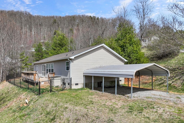6 Clark Meadow Ln, Candler, NC 28715 - rear view of house with a gate, fence, crawl space, a wooded view, and a yard