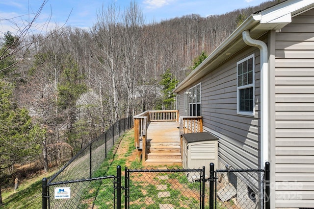 6 Clark Meadow Ln, Candler, NC 28715 - exterior space with a wooded view, a gate, and fence