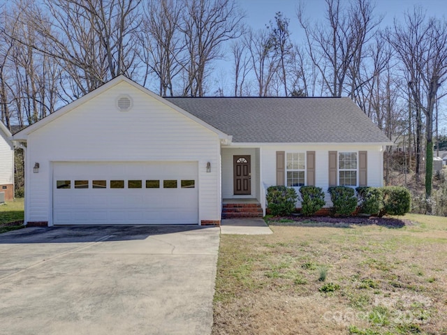 ranch-style home with a garage, a front yard, roof with shingles, and driveway