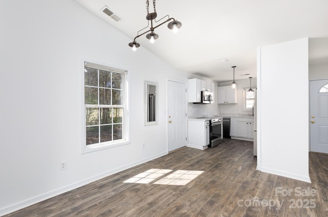 kitchen with range with electric cooktop, visible vents, white cabinetry, light countertops, and dark wood finished floors