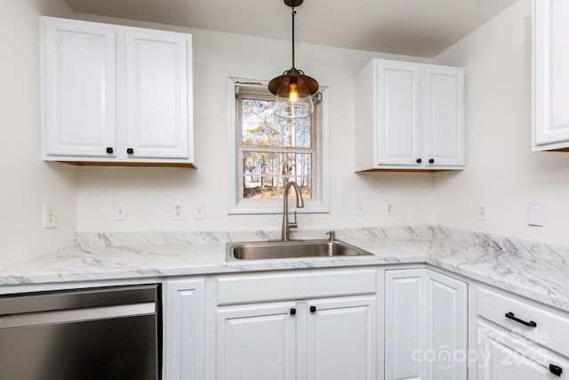 kitchen with white cabinetry, dishwasher, decorative light fixtures, and a sink