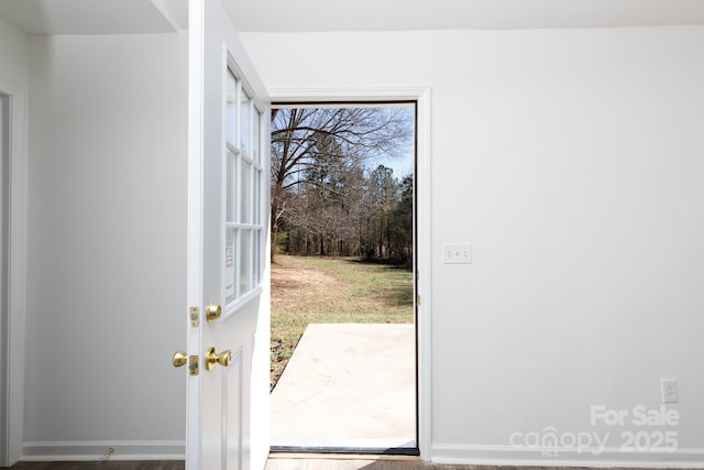 doorway with baseboards