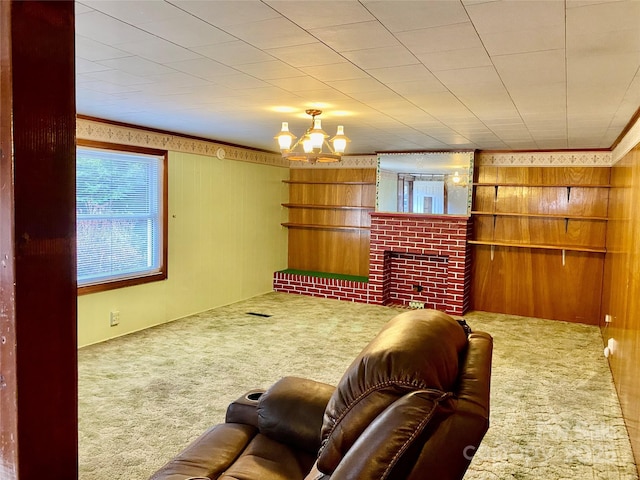 carpeted living room featuring wood walls and visible vents