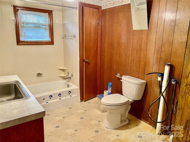 full bath with toilet, a bathing tub, and vanity