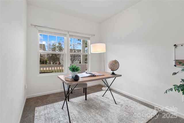 office space featuring carpet and baseboards