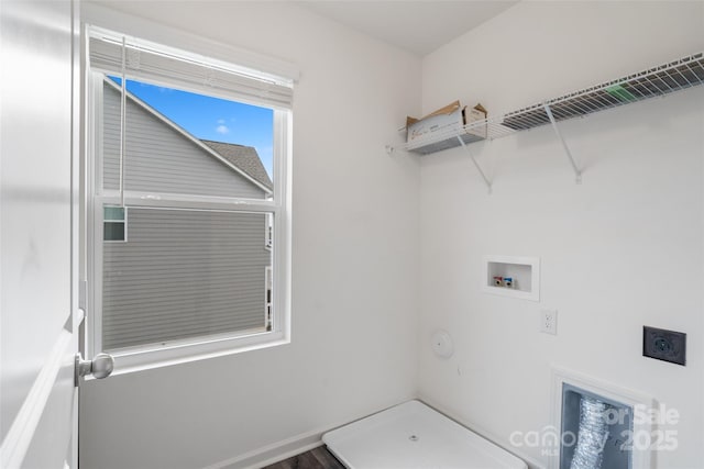 laundry area featuring washer hookup, laundry area, electric dryer hookup, and baseboards