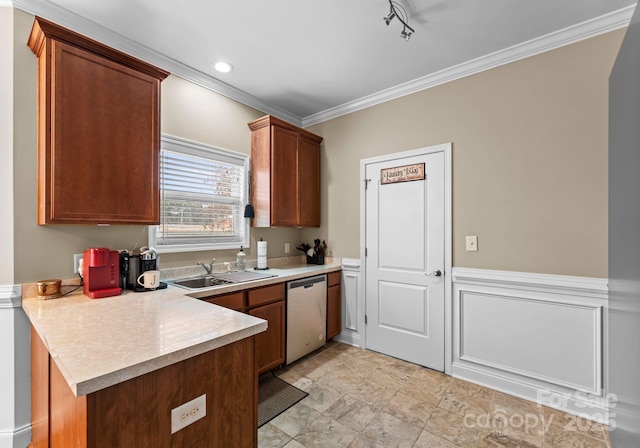 kitchen featuring crown molding, dishwasher, light countertops, a peninsula, and a sink